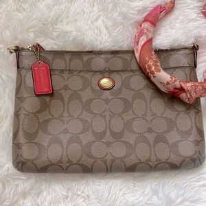 Coach signature pouch/crossbody bag